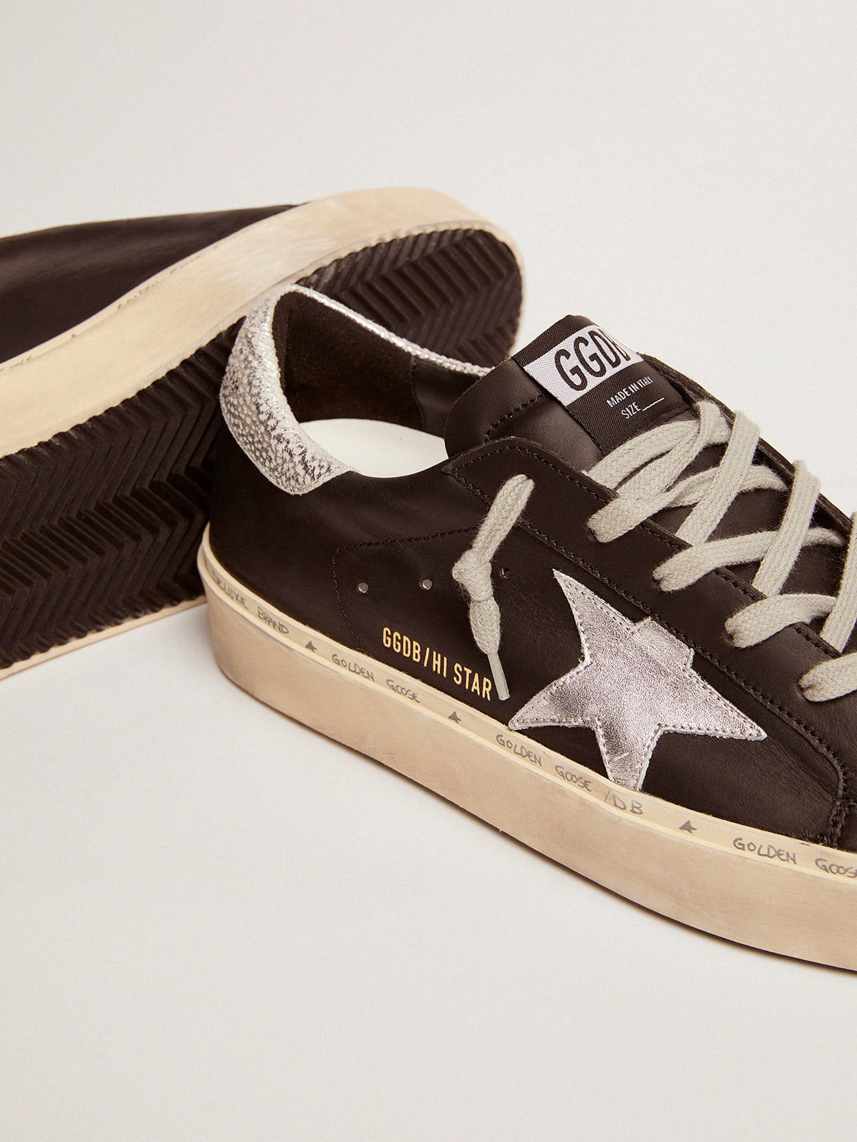 Sneaker Hi Star in pelle nera con stella in pelle laminata color argento