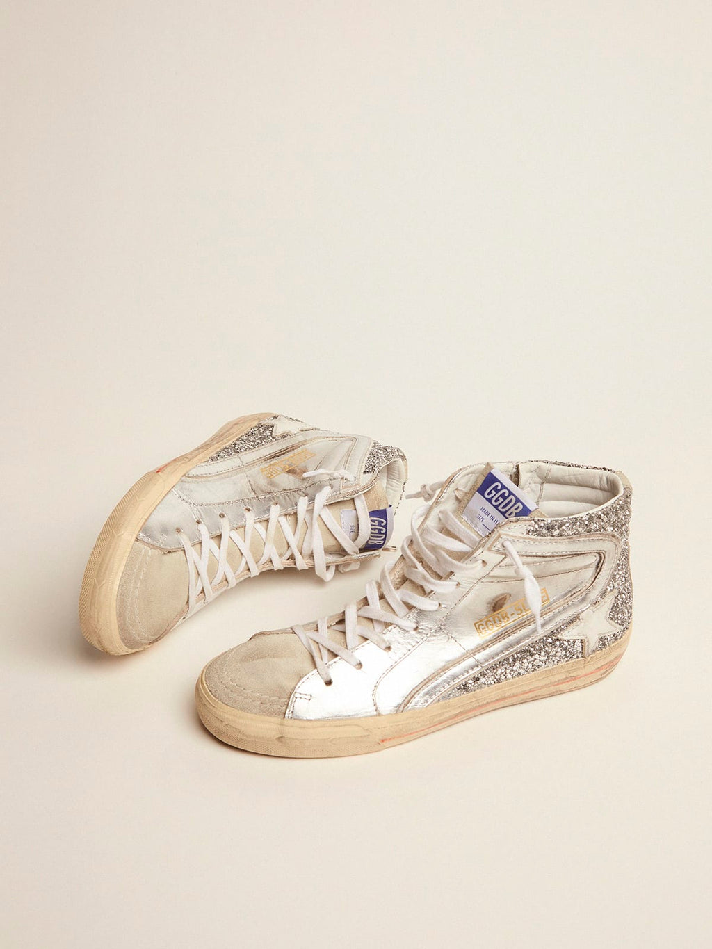 Sneaker Slide con tomaia in pelle laminata e glitter argento