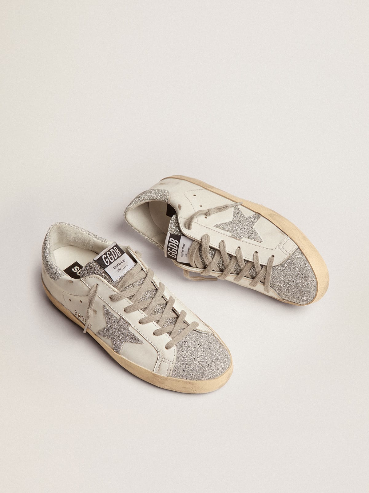 Sneaker Super-Star con tomaia in pelle bianca e inserti in cristalli Swarovski