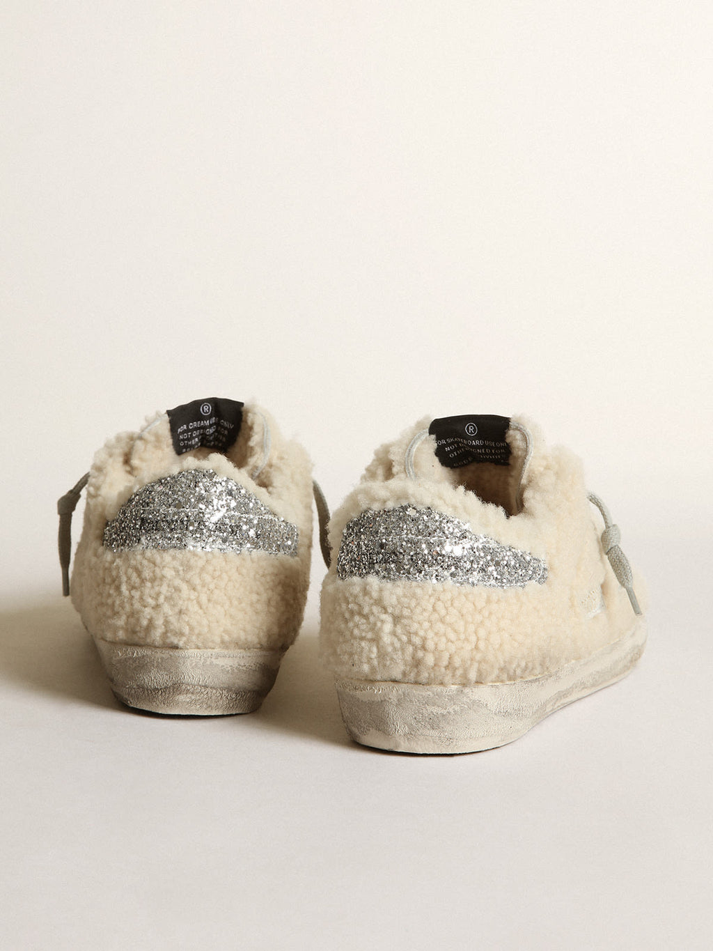 Sneaker Super-Star in shearling beige con stella e talloncino in glitter argento
