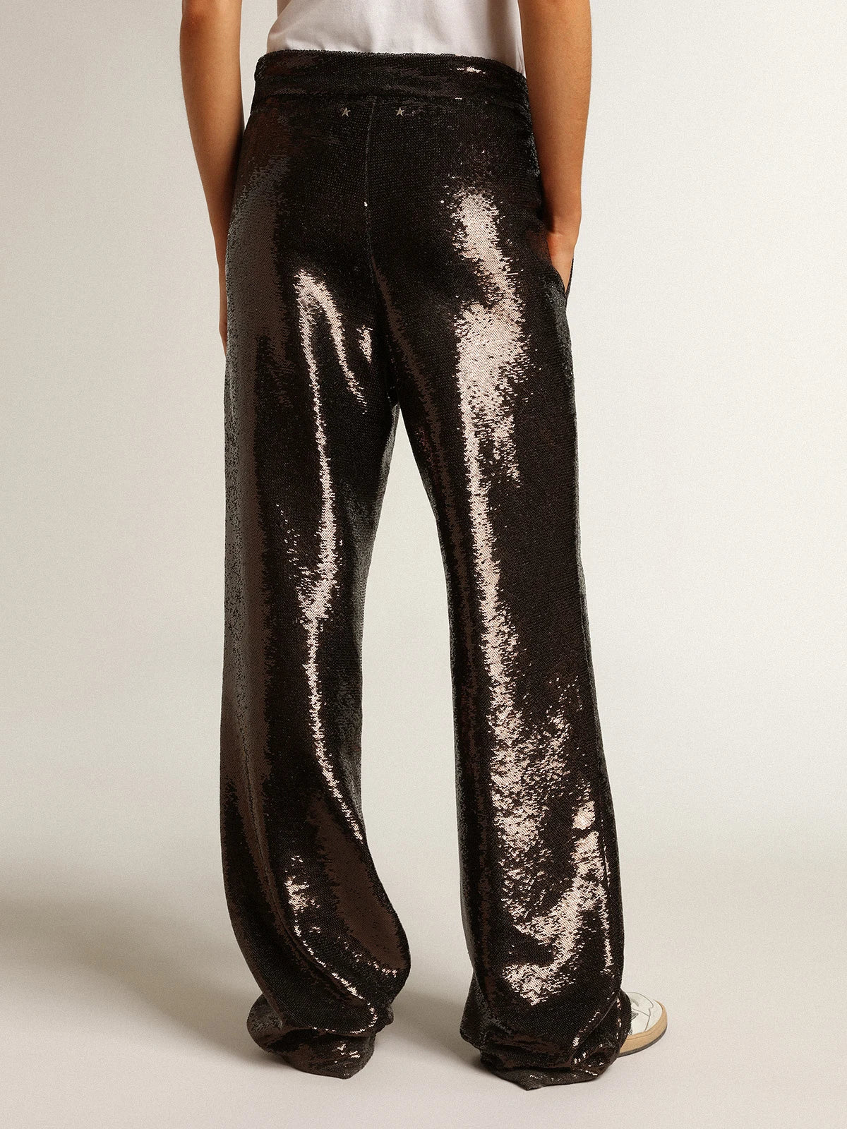 Pantalone di color grigio con paillettes all-over