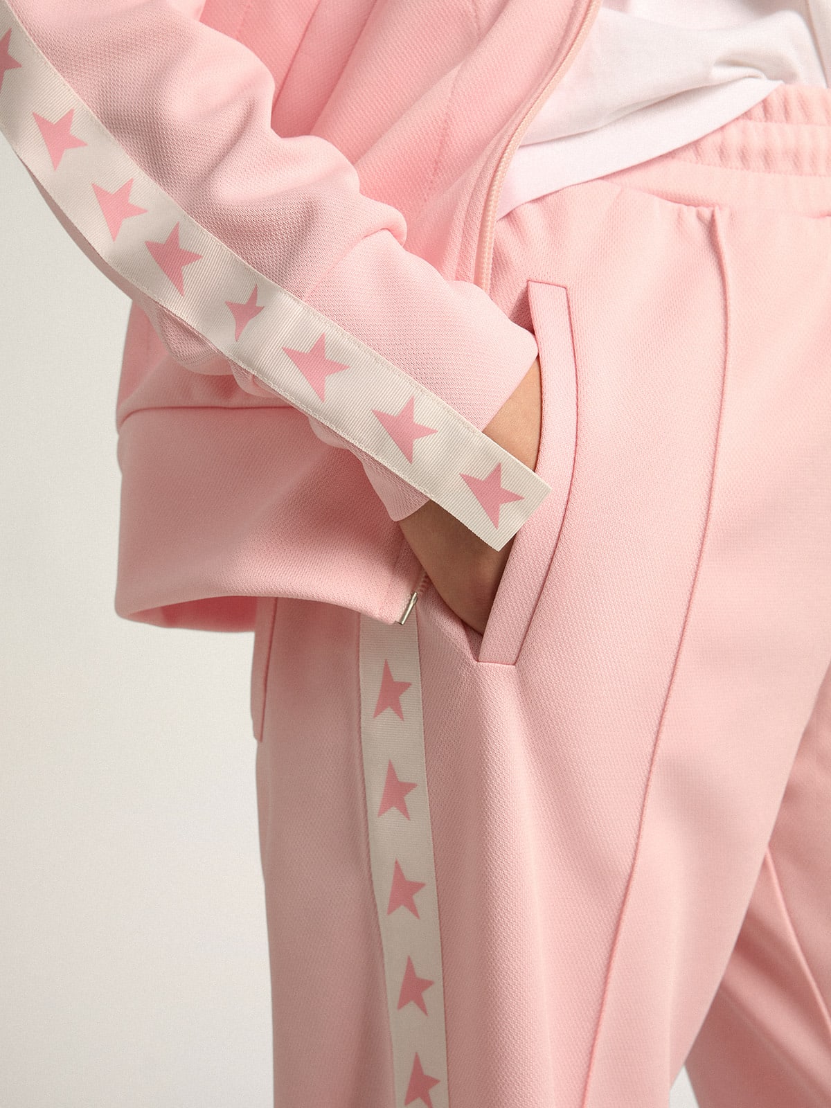 Felpa con zip da donna di colore rosa con stelle rosa a contrasto