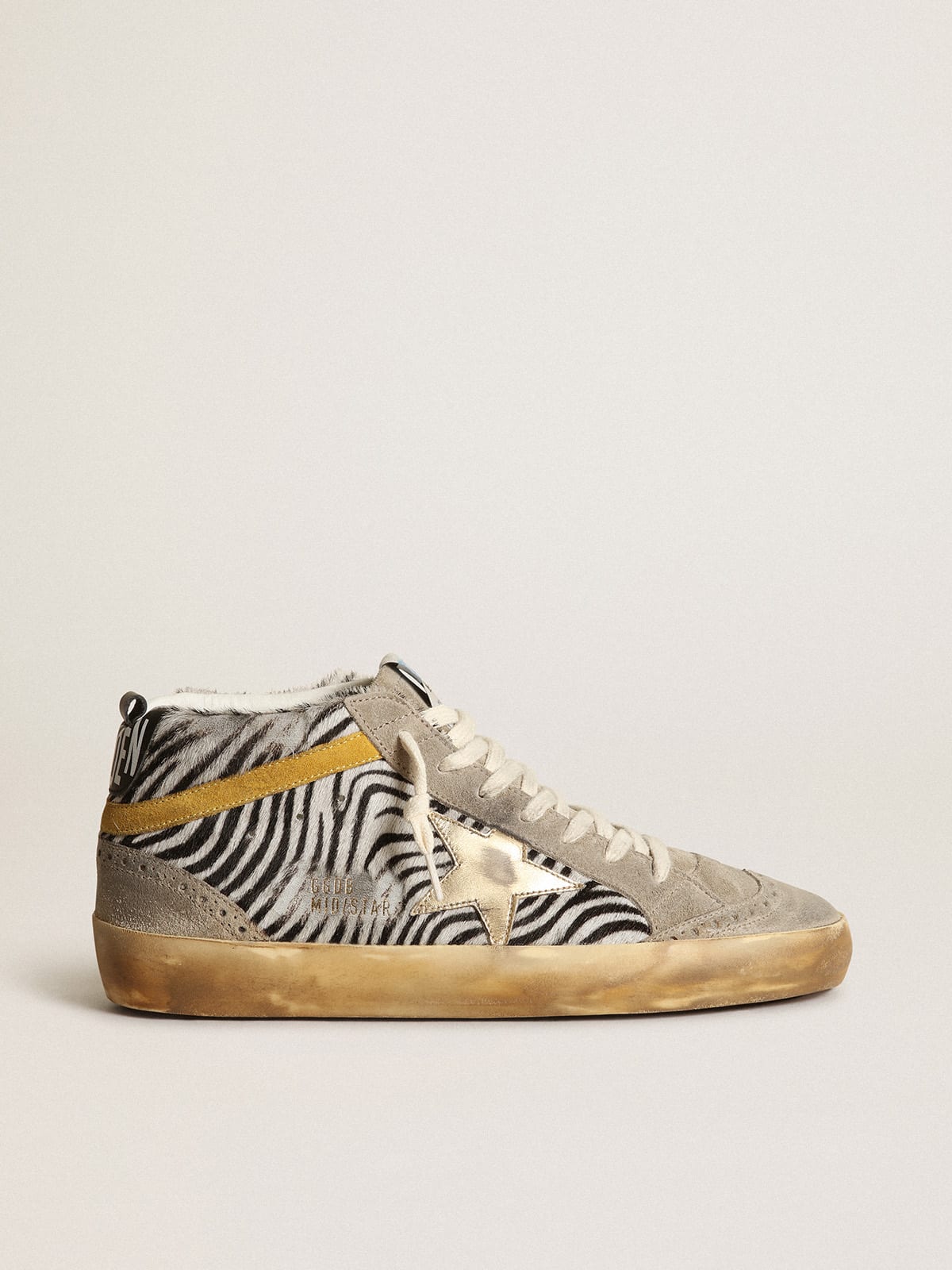 Sneaker Mid Star in cavallino zebrato con stella in pelle laminata dorata e virgola in suede color senape