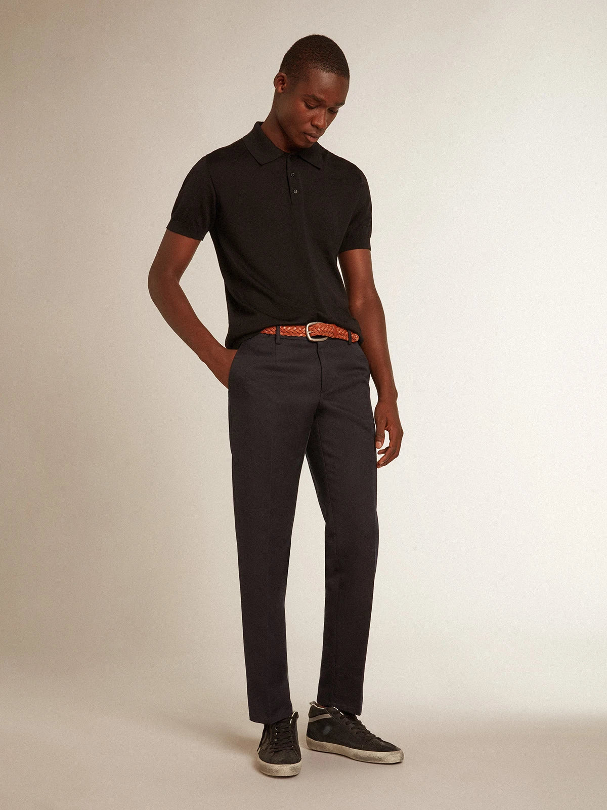 Polo maniche corte da uomo in lana merino di colore nero