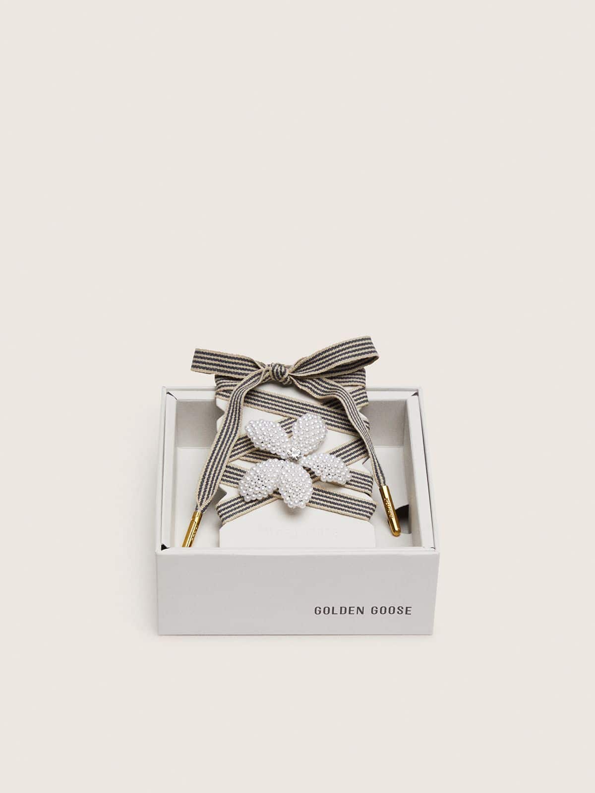 Skins "Vintage" black and beige striped laces with flower-shaped charm