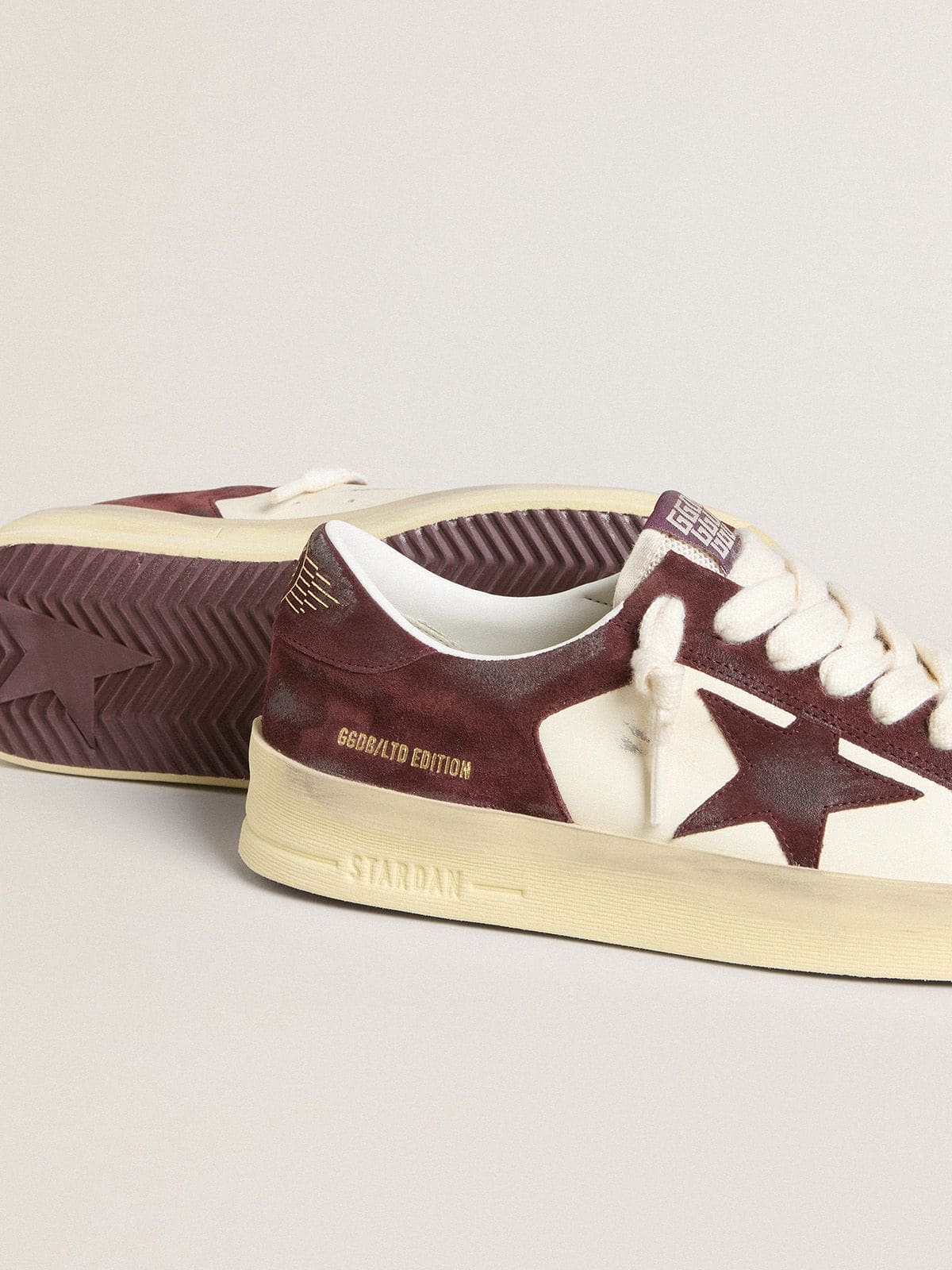 Women’s Stardan in white nappa with burgundy suede star and heel tab
