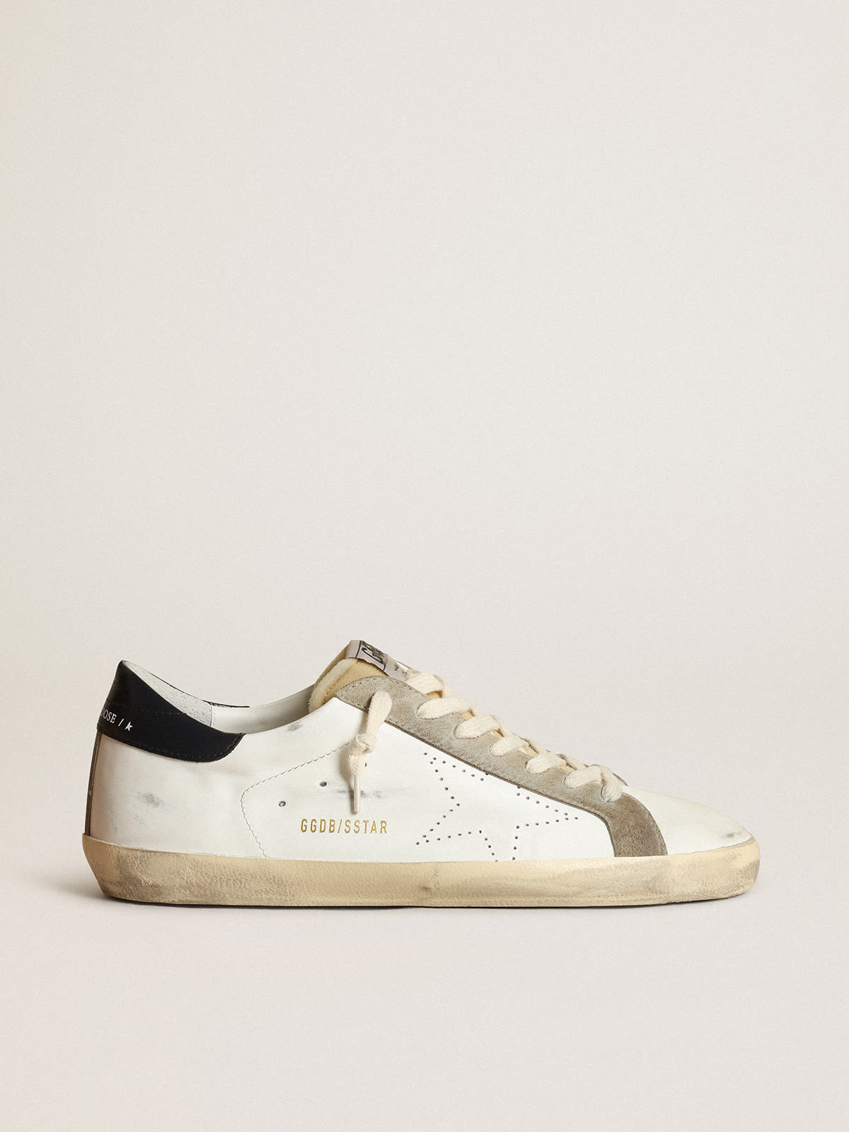 Sneaker Super-Star Uomo con stella traforata e talloncino in pelle lucida color blu notte