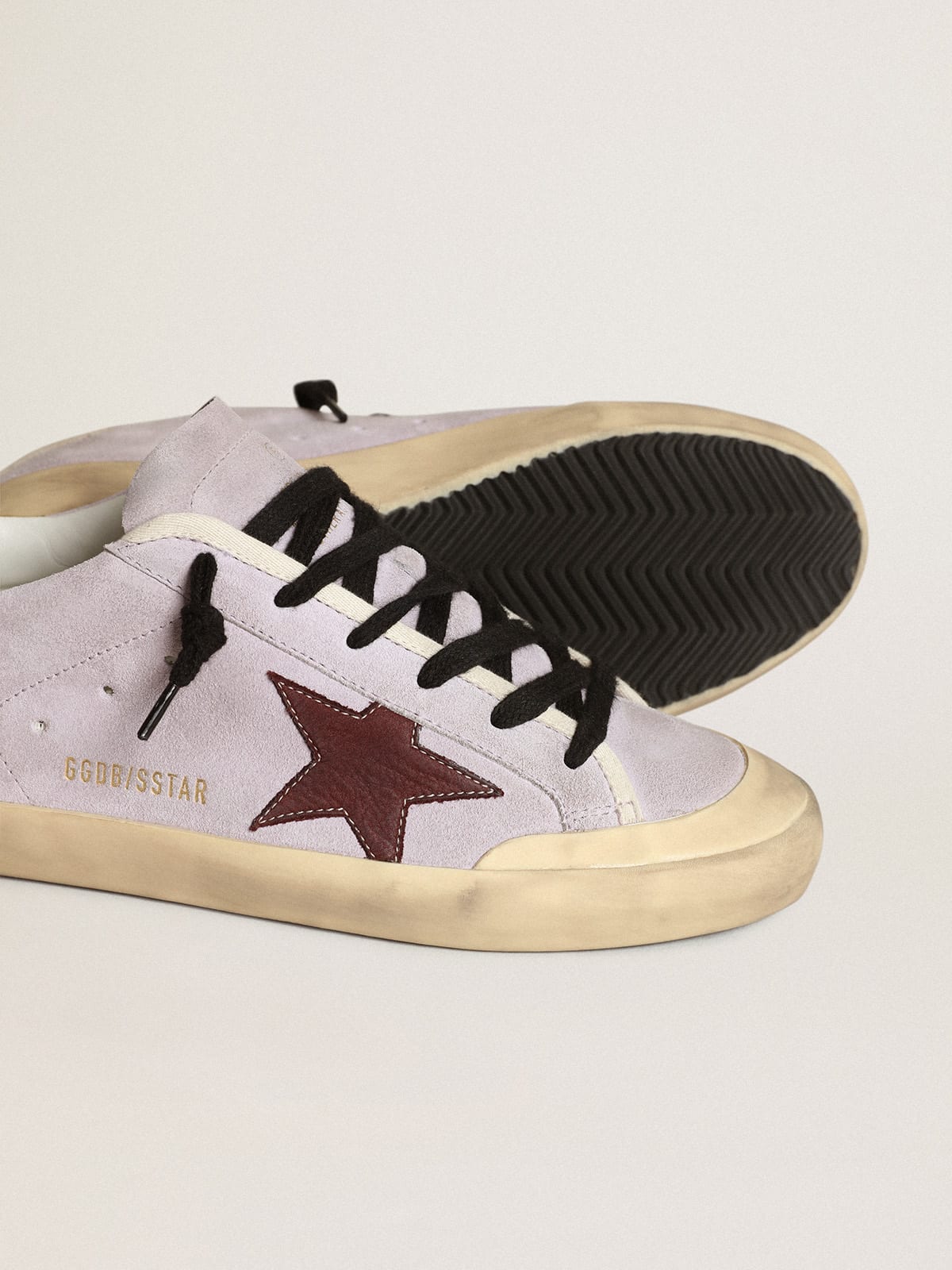 Super-Star in suede lilla con stella marrone e talloncino dorato