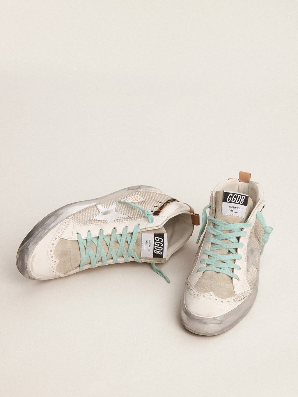 Sneaker Mid Star con stella in pelle laminata color argento e virgola in cavallino leopardato