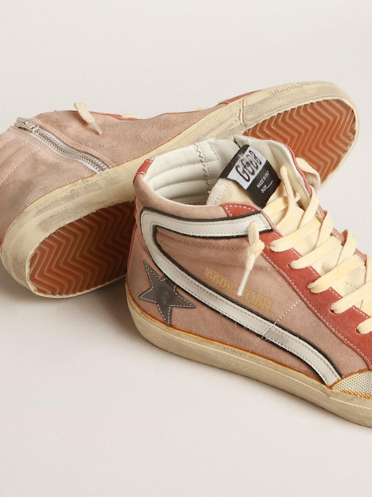 Slide in suede rosa con stella in pelle laminata color antracite