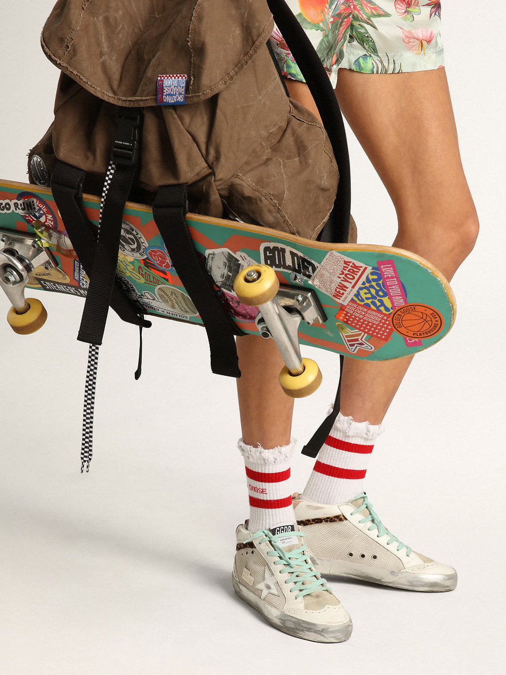 Sneaker Mid Star con stella in pelle laminata color argento e virgola in cavallino leopardato