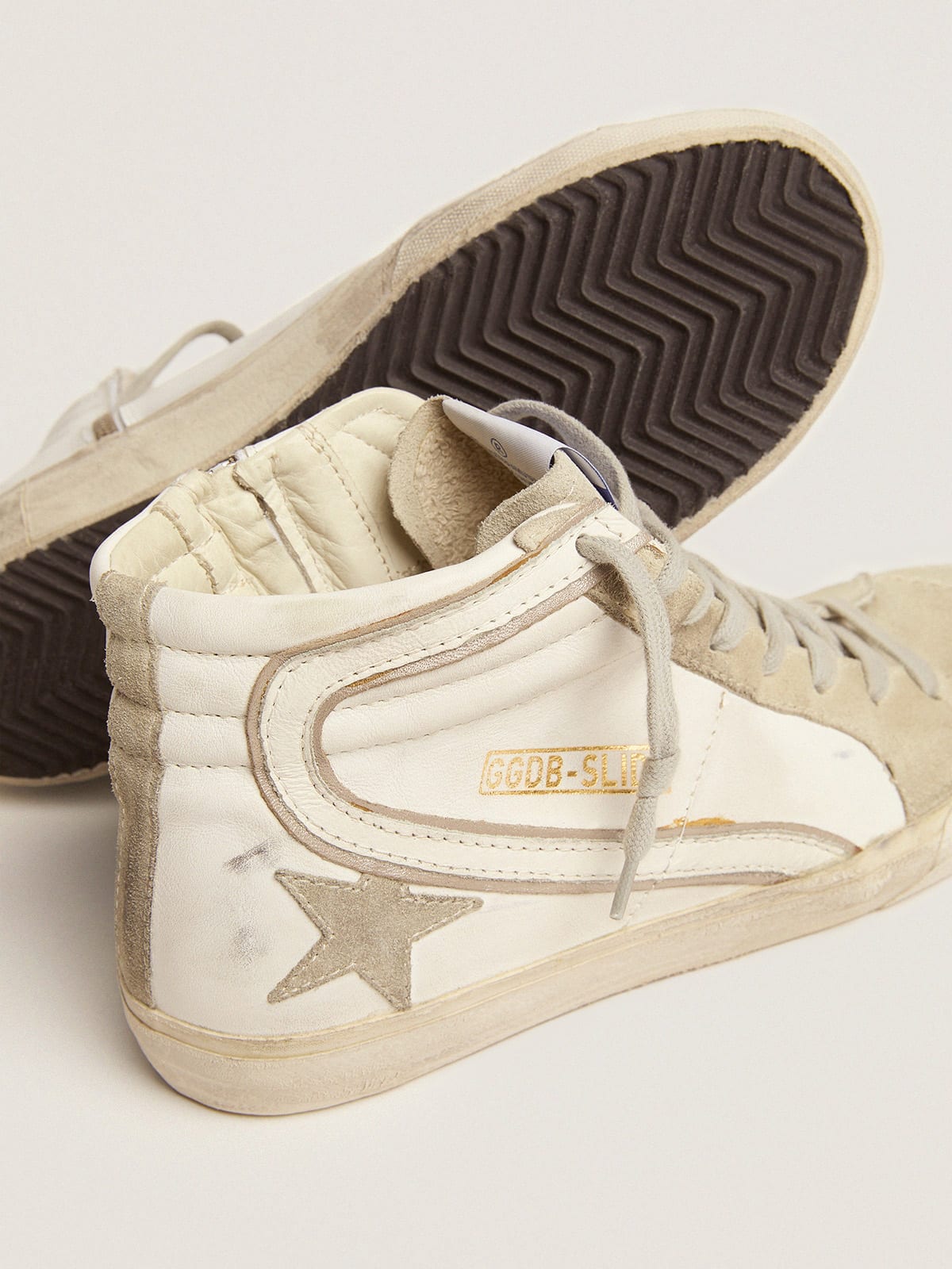 Sneaker Slide con stella in suede grigio ghiaccio e virgola in pelle bianca