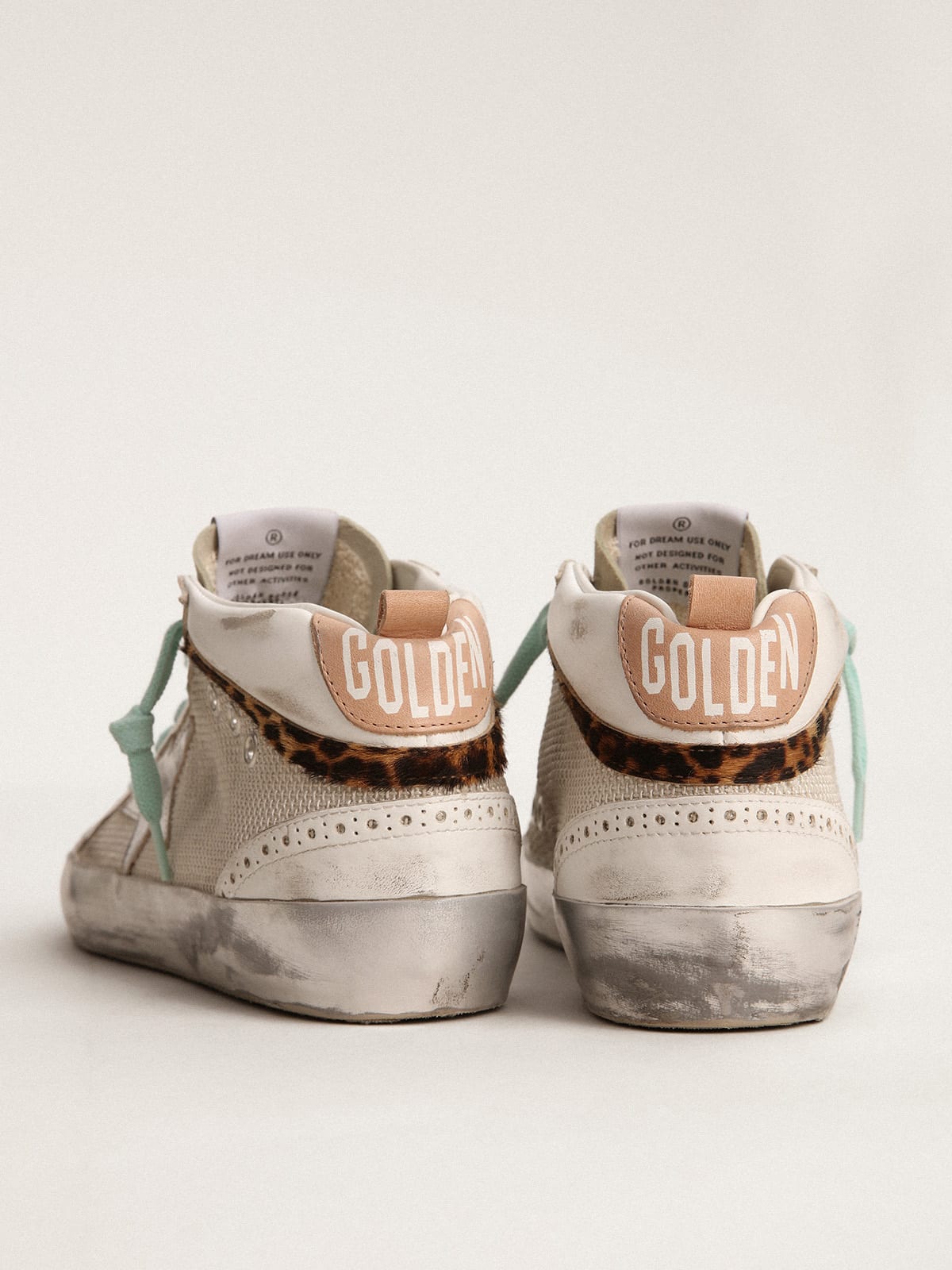 Sneaker Mid Star con stella in pelle laminata color argento e virgola in cavallino leopardato