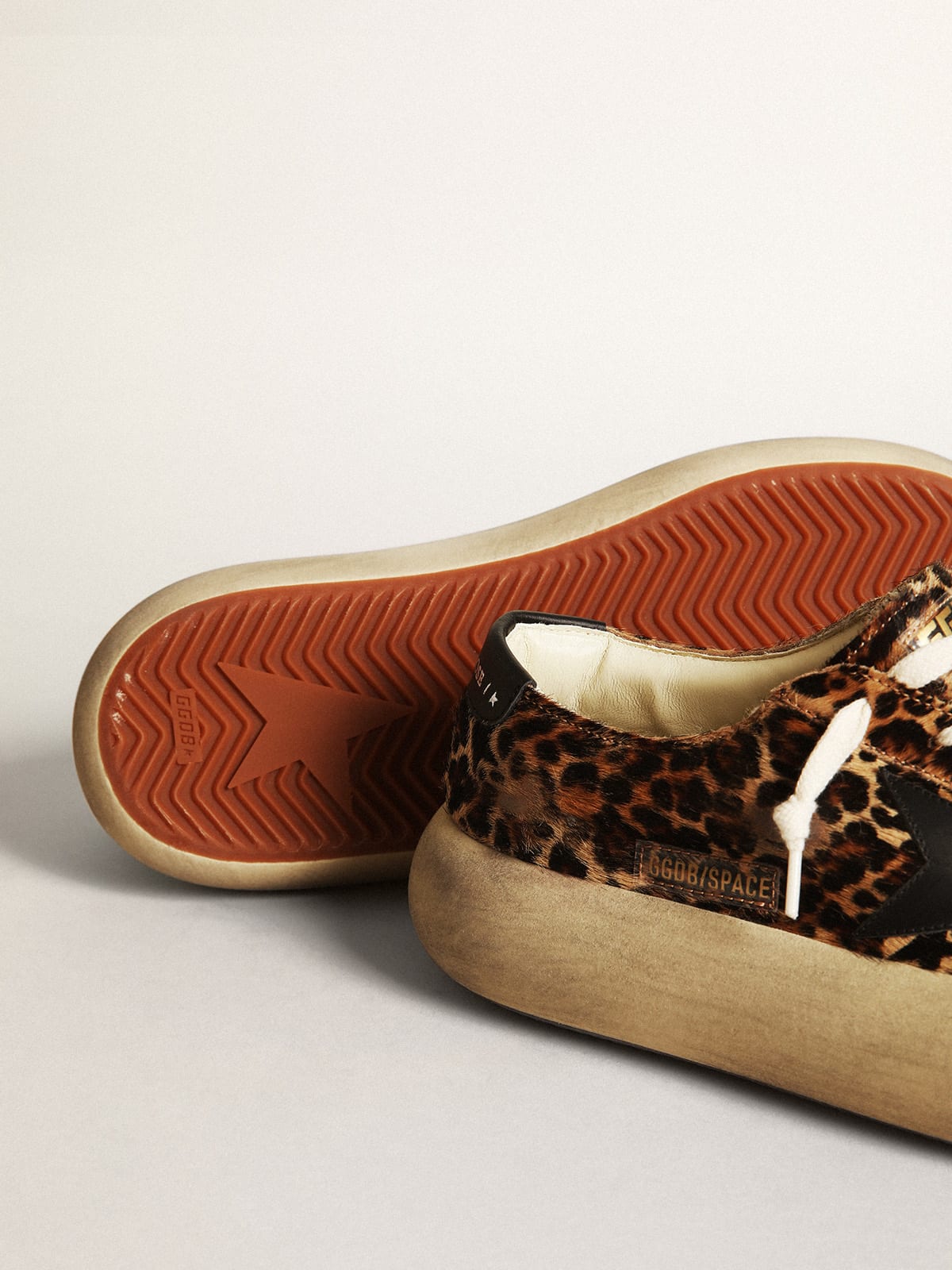 Scarpe Space-Star Donna in cavallino leopardato con stella e talloncino in pelle nera