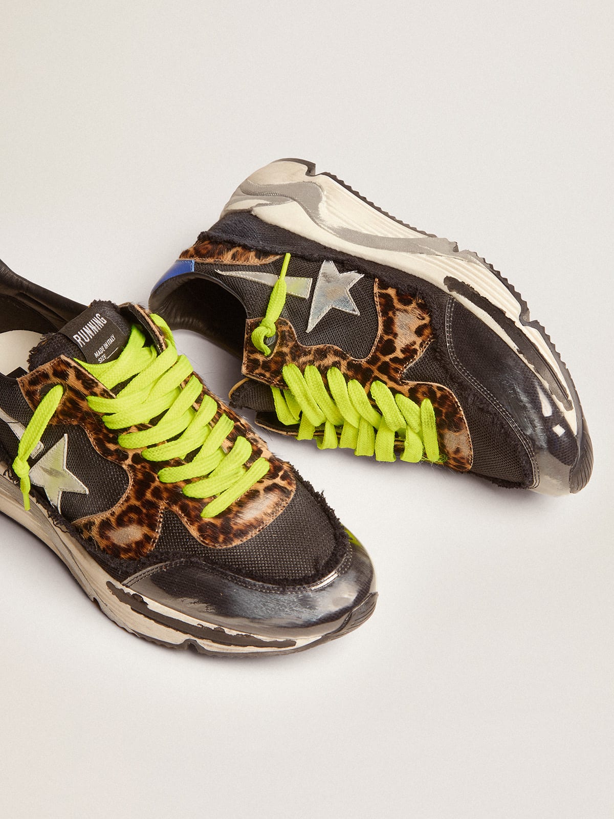 Sneaker Running Sole LTD in rete nera con inserti in cavallino leopardato e stella in pelle laminata color argento