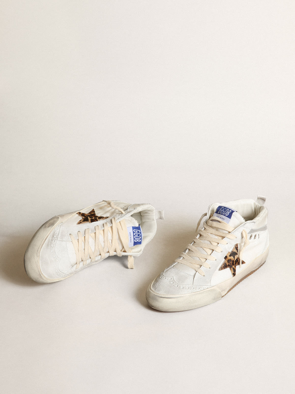 Sneaker Mid Star LTD in nylon bianco con stella in cavallino leopardato e talloncino in pelle laminata rosa